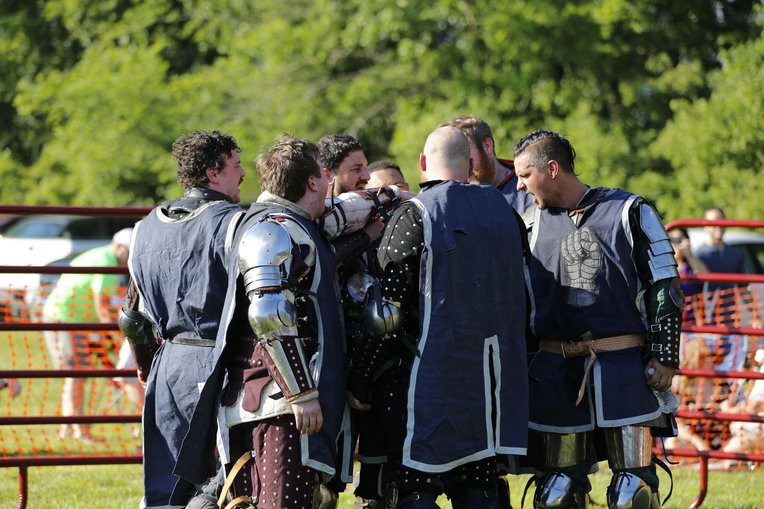 The knights gather together in celebration after the event.