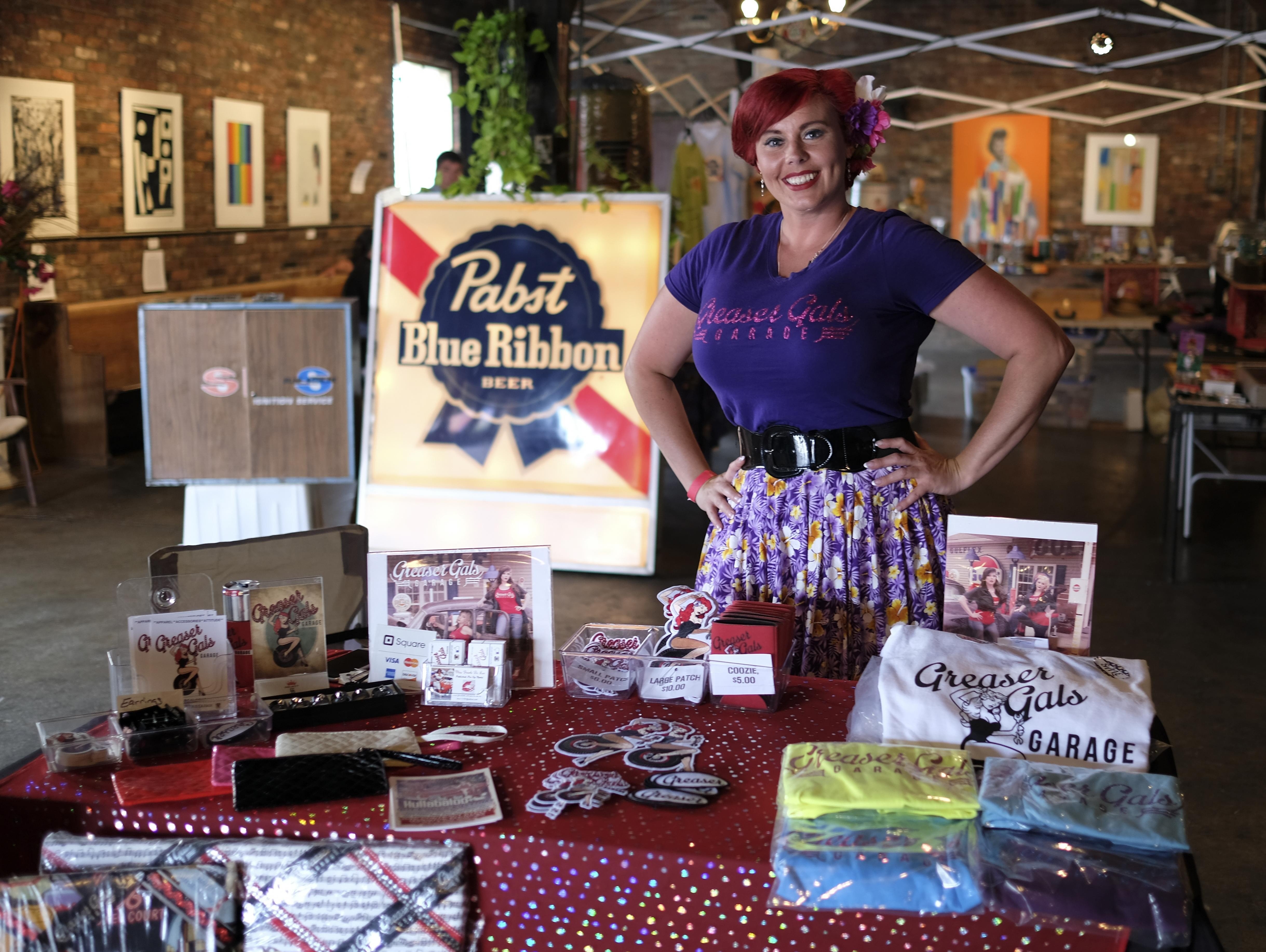 Kimberly Petree aka Pearle De Lux stands by her table for the Greaser Gals Garage where she sells t-shirts and also her hand made jewelry and hair bows. &#147;It&#146;s originally a bunch of us girls that are learning how to work on our own cars. I&#146;ve got a 1953 Chevy Bel Air I work on, and my business partner has a 69 Chevelle.  I have some other friends that have newer Jeeps and Camaros, and we just kind of have our own thing&#133; It&#146;s almost like a social club, and we like to go to the different events and travel around to look at cars.&#148;