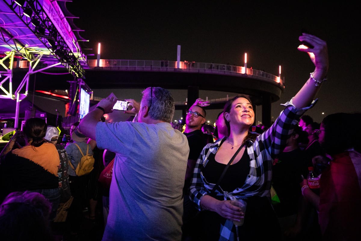 Members of the crowd grabbed selfies during the performances on Saturday night.