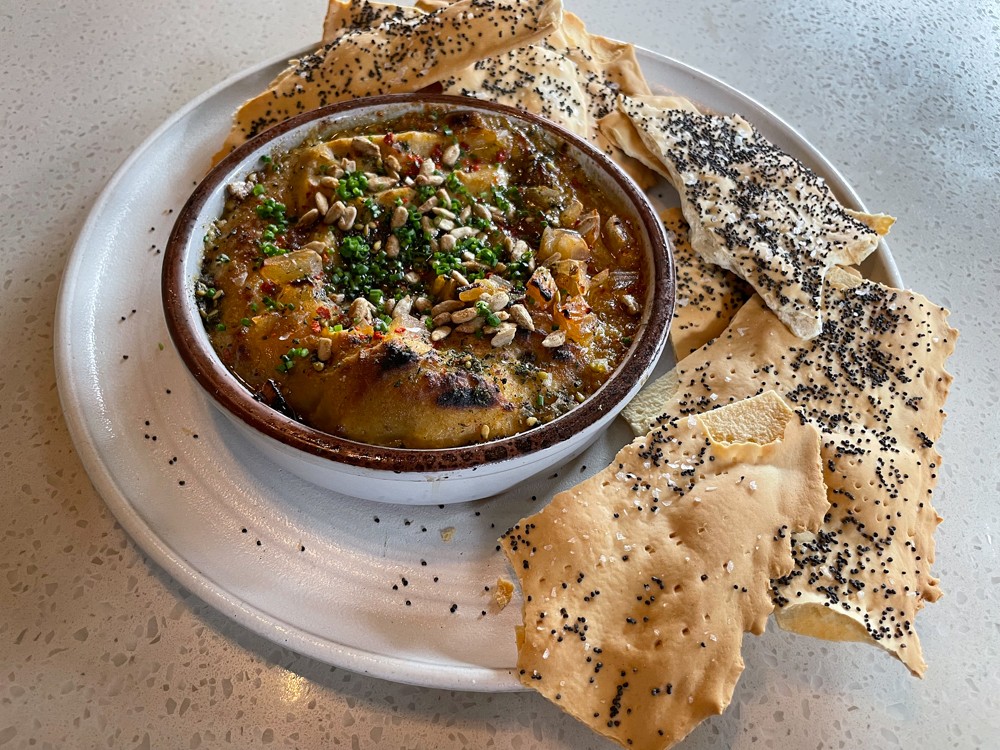 You haven't tasted hummus until you've tried Paseo's thick, rich hummus brulee with crisp toasted lavash for dipping.