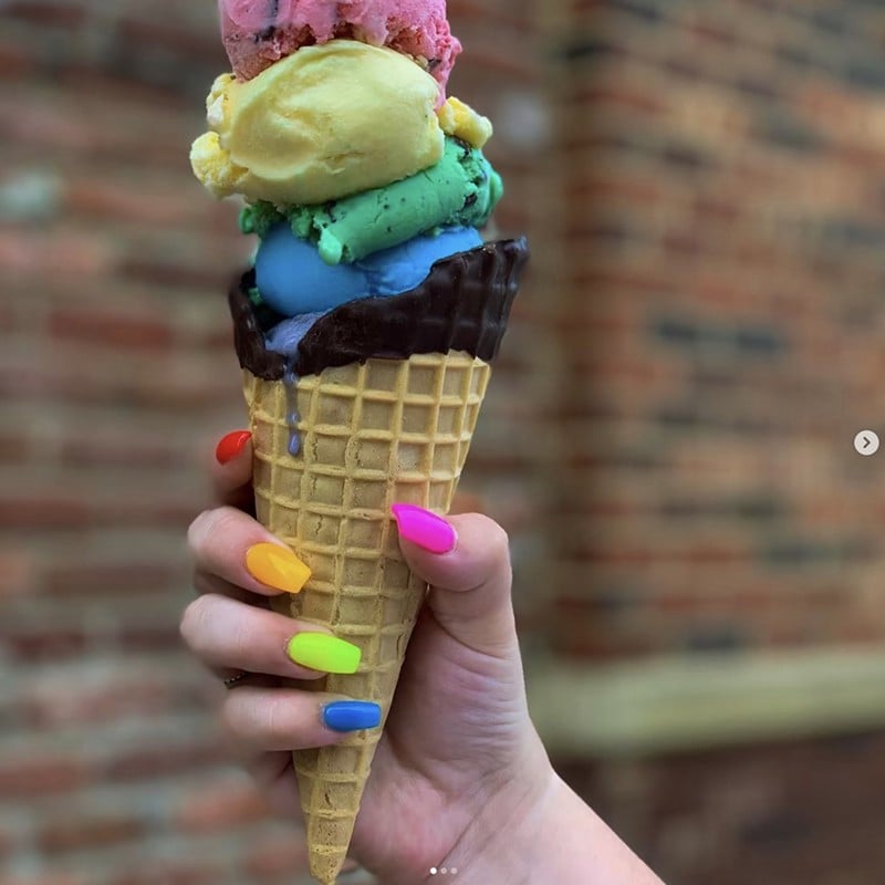 A colorful stack of scoops, and nails to match, in this Instagram post by Homemade Ice Cream and Pie Kitchen. - Instagram