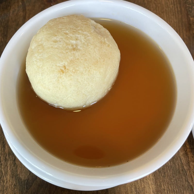 Mamma mia, that's one big matzoh ball! But don't overlook the delicious, subtle broth that might cure what ails you. - Robin Garr