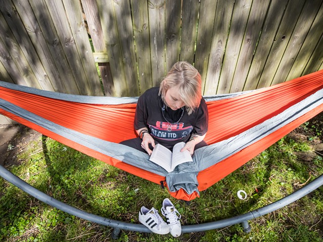 To get some fresh air, I would sit in our hammock in the backyard and read.